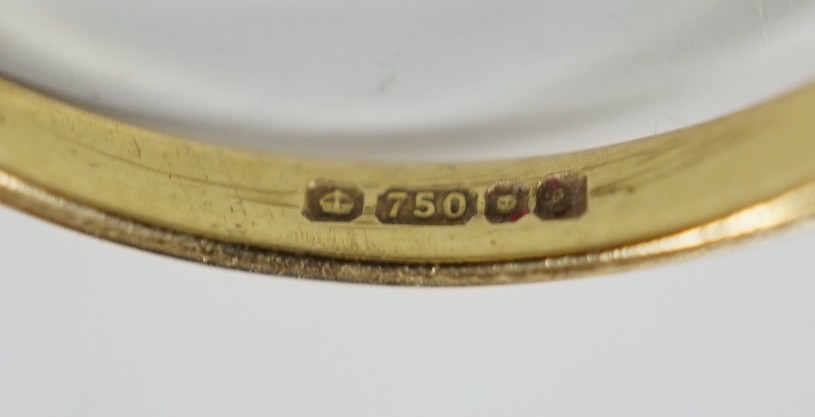 A modern 18ct gold and collet set solitaire diamond ring, size N, gross weight 3.1 grams, the stone diameter approx. 6.1mm